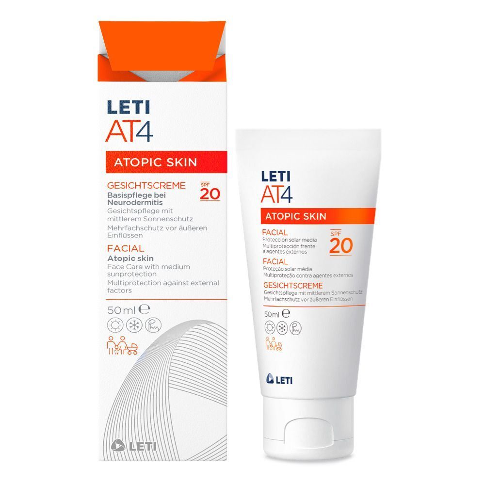 Weiße Tube und orangefarbene Schachtel LETI AT4 Gesichtscreme SPF 20. Aufschrift: ATOPIC SKIN, FACIAL, GESICHTSCREME, 20.