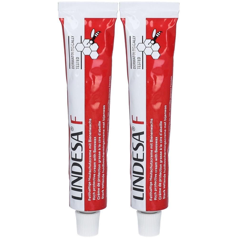Zwei Tuben LINDESA F Hautschutzcreme. Rot-weißes Design, Schriftzug und Logo. Dermatologisch getestet.