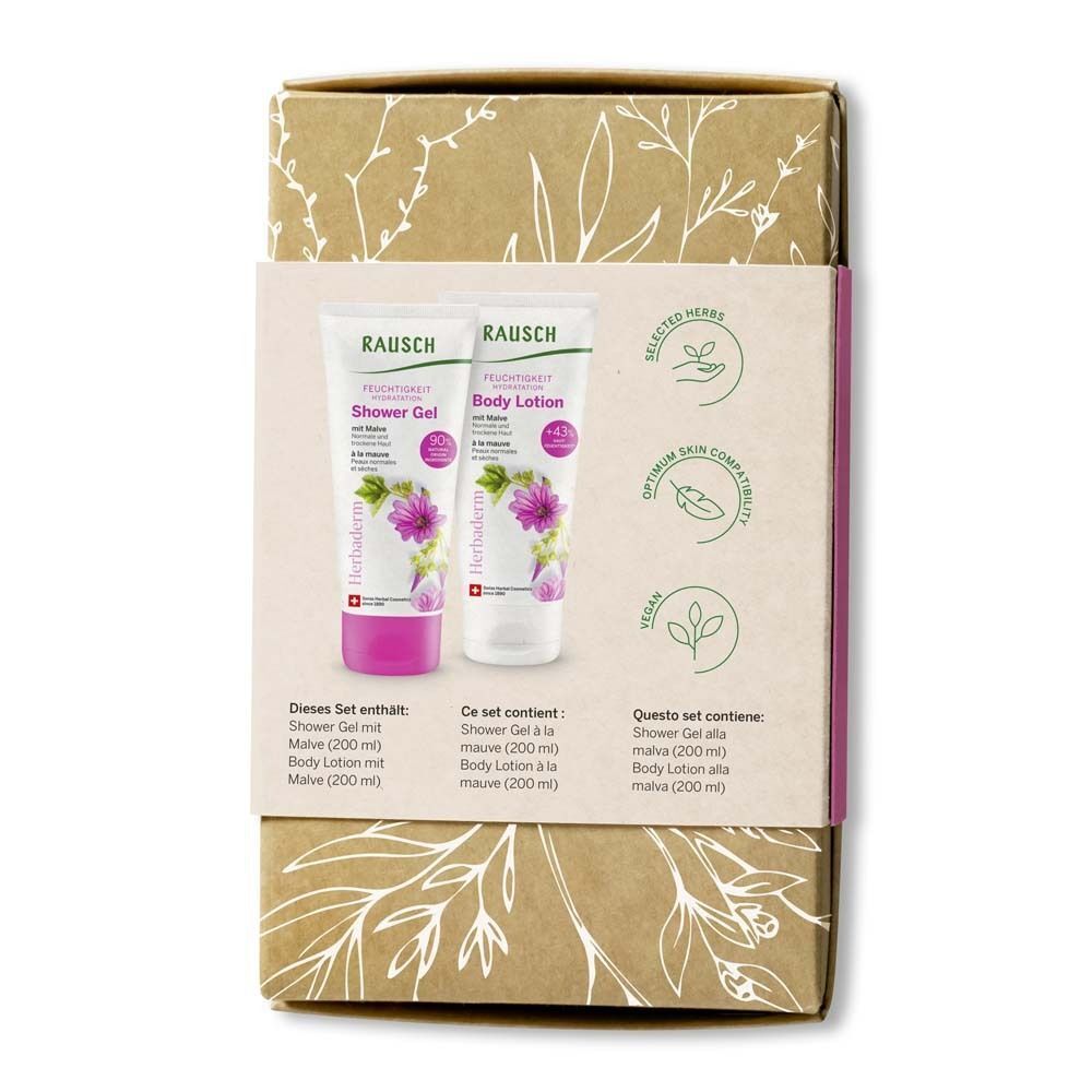 Rückseite eines Geschenksets. Enthält Duschgel und Body Lotion. Text in Deutsch, Französisch und Italienisch. Vegan-Siegel.
