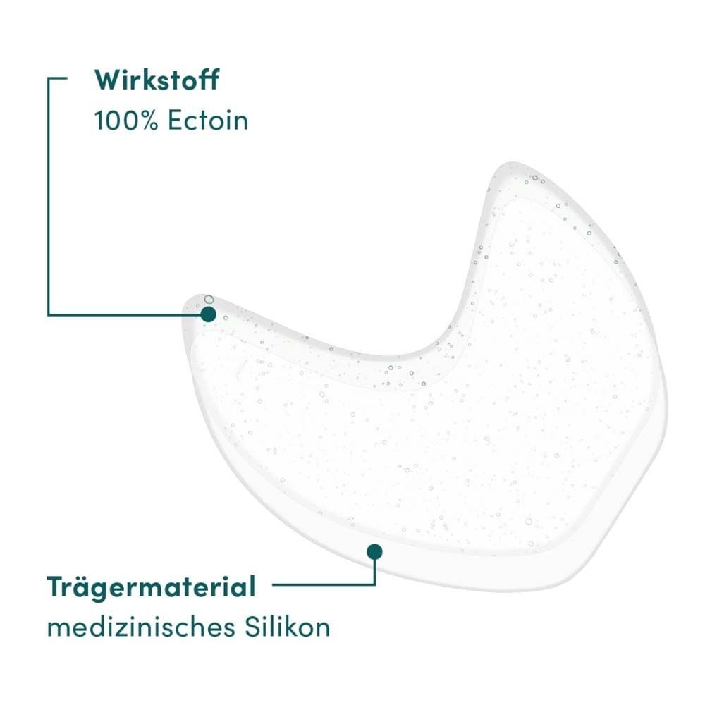Nahaufnahme eines Augen-Schläfen Pads. Beschriftung: Wirkstoff 100% Ectoin, Trägermaterial medizinisches Silikon.