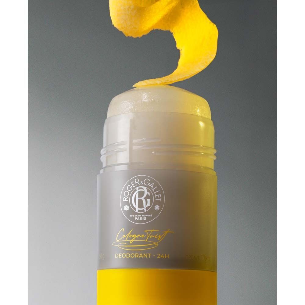 Deodorant-Stift mit gelbem Boden und grauer Hülle. Gelbe Schale wird abgerollt. Aufschrift: ROGER&GALLET, Cologne Twist, Deodorant - 24H.