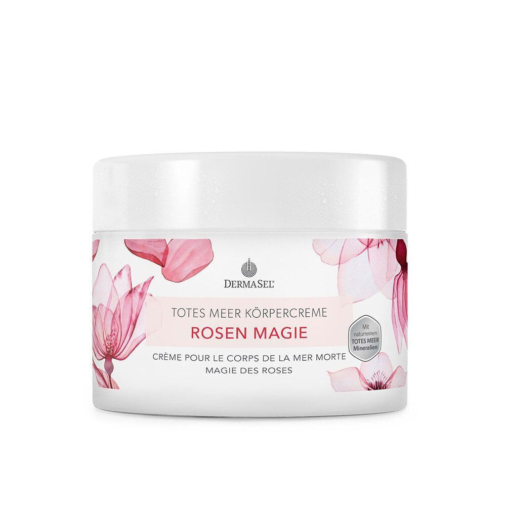 Weißer Tiegel mit Deckel. Aufdruck: DERMASEL, Totes Meer Körpercreme Rosen Magie. Rosa Blütenmuster und Text.