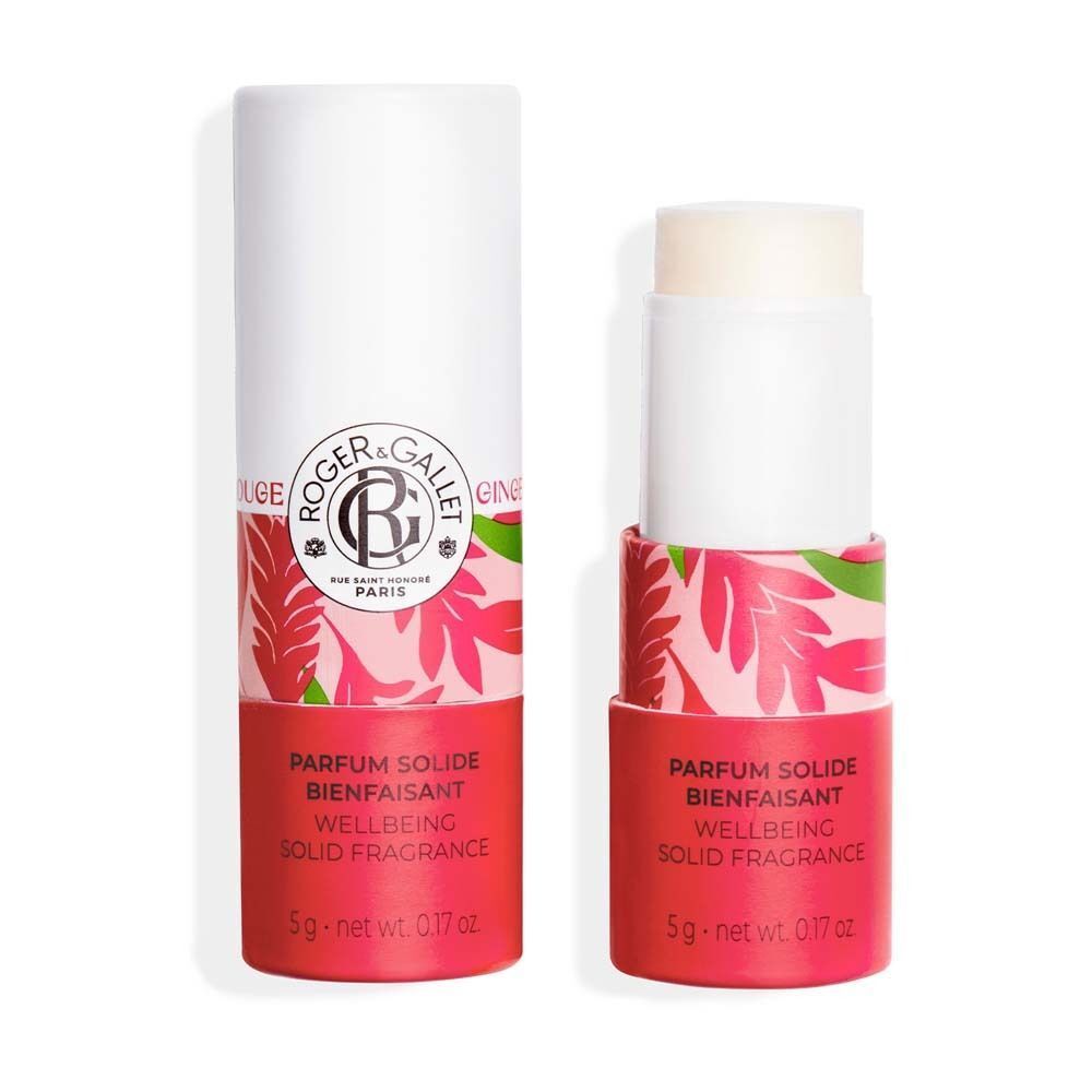 Ein Parfumstick, teilweise herausgedreht. Weißer Deckel, roter Boden mit floralem Muster. Text: PARFUM SOLIDE BIENFAISANT, WELLBEING SOLID FRAGRANCE.