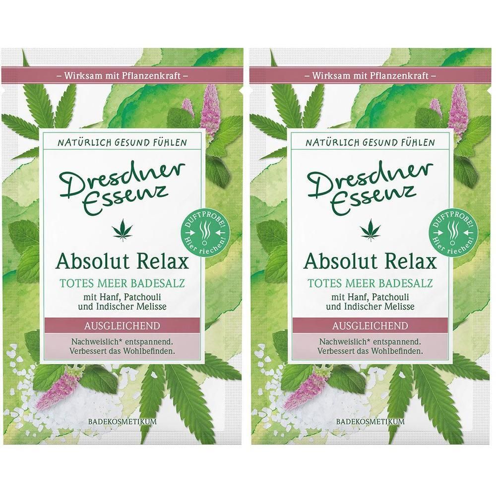 Zwei Beutel Dresdner Essenz Absolut Relax Badesalz. Verpackung mit Pflanzenmotiven und Produktinformationen. Enthält Totes Meer Badesalz.