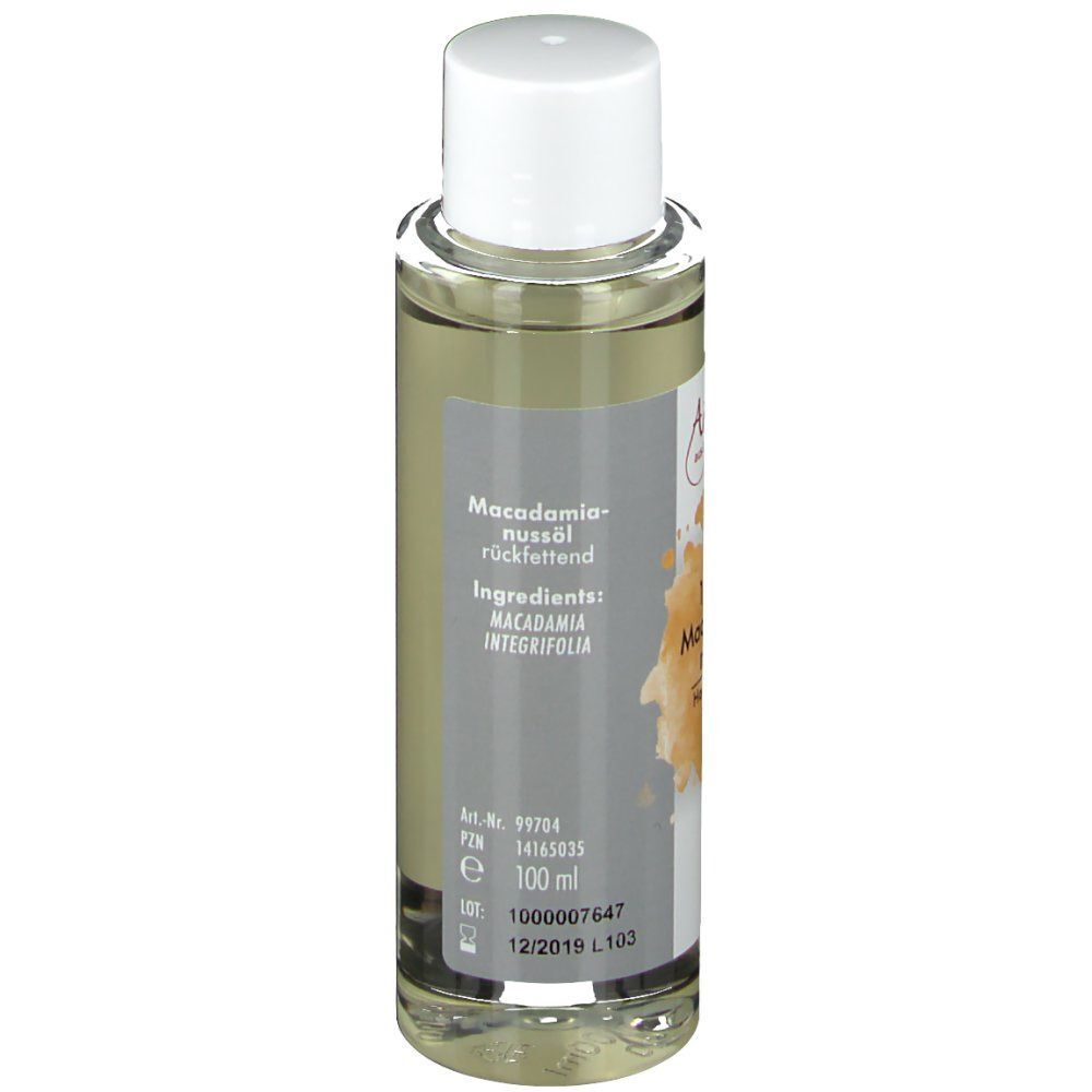 Flasche mit weißem Deckel. Aufschrift: Macadamianussöl rückfettend. Ingredients: MACADAMIA INTEGRIFOLIA. 100 ml.