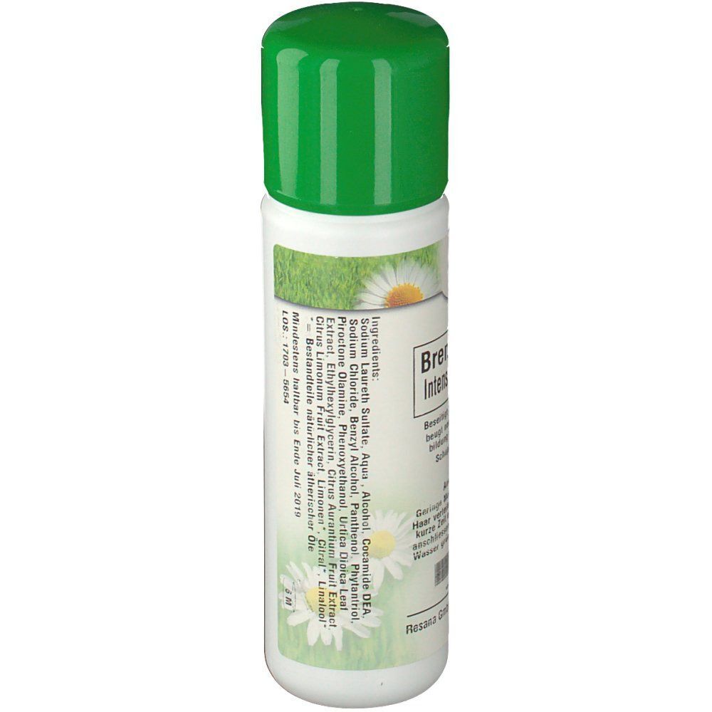 Weiße Shampoo-Flasche mit grünem Deckel. Rückseite mit Inhaltsstoffen und Blümchen.