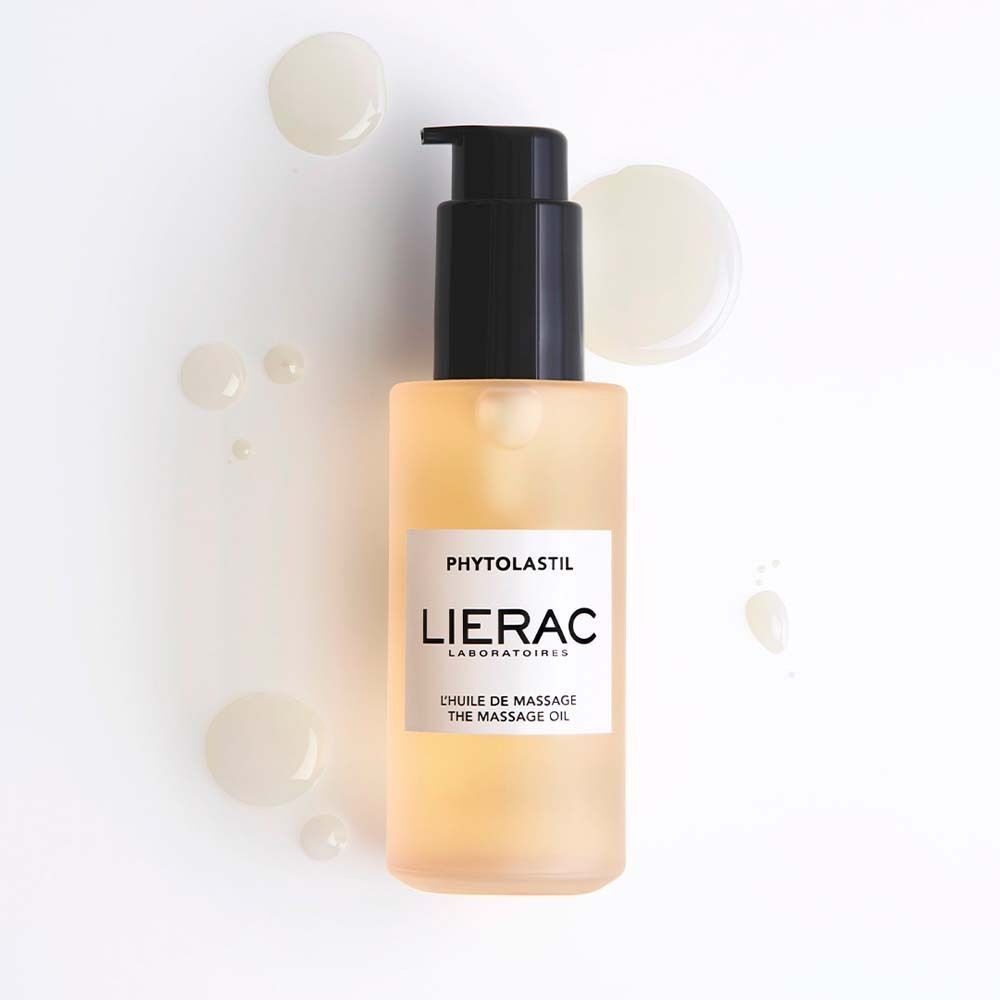 Flasche mit schwarzem Pumpverschluss und Öltropfen. Aufschrift: LIERAC, Phytolastil, L'huile de massage, The massage oil.