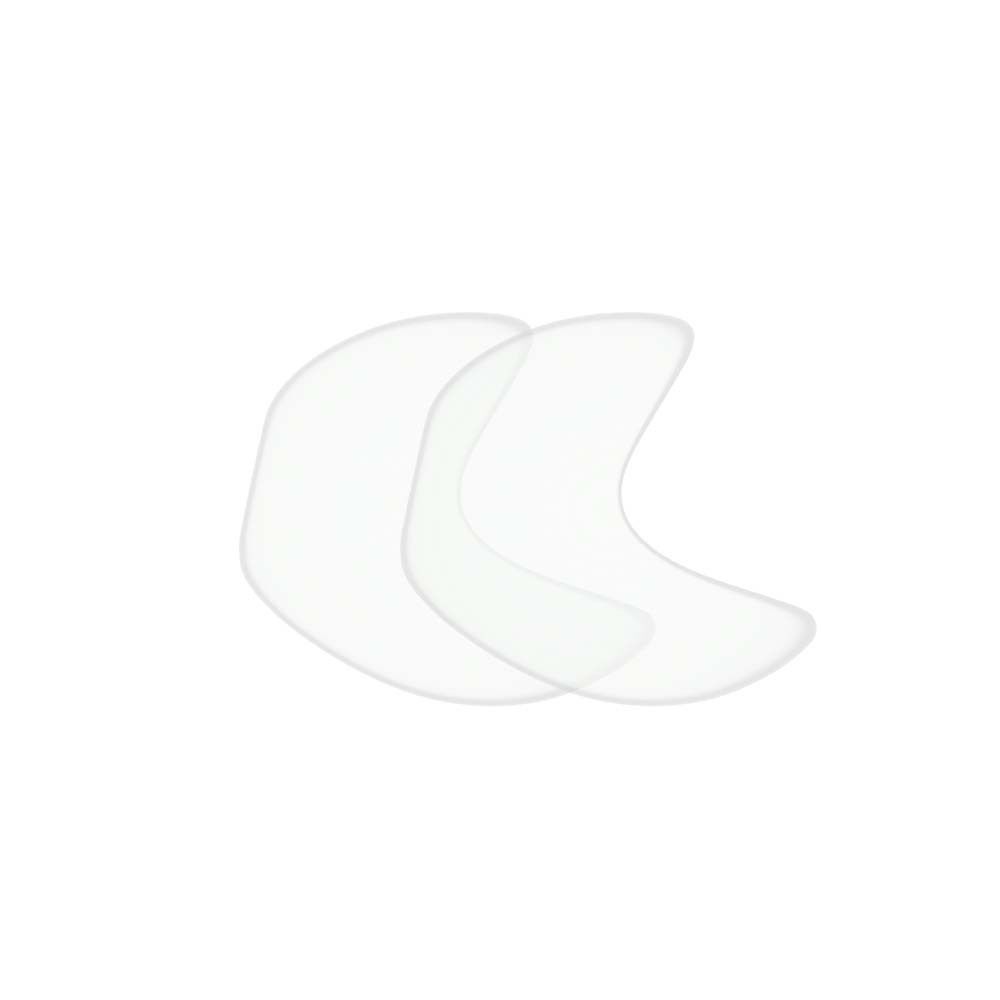Zwei transparente, halbmondförmige Augen-Schläfen Pads. Die Pads sind leicht durchscheinend.