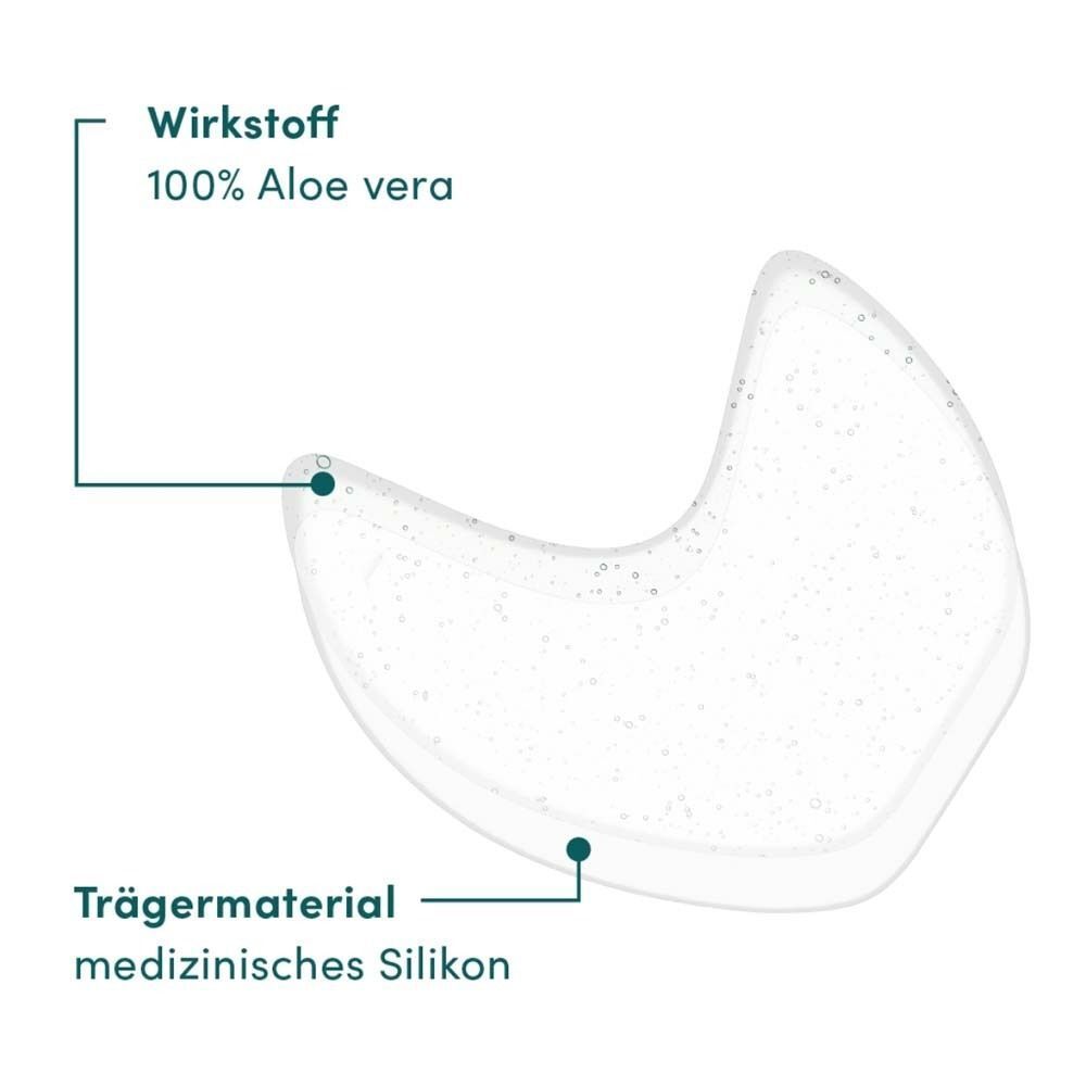 Nahaufnahme eines Augen-Schläfen Pads. Beschriftung: Wirkstoff 100% Aloe vera, Trägermaterial medizinisches Silikon.
