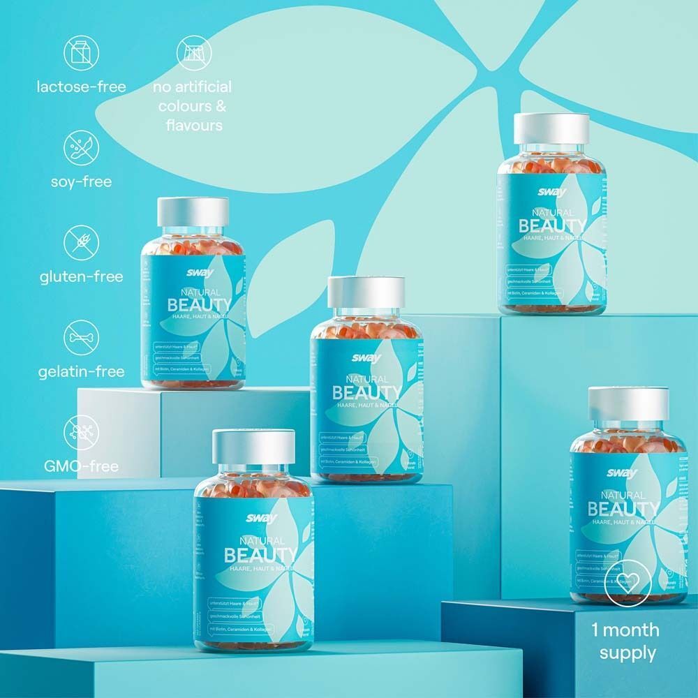 Fünf Flaschen sway Timeless Beauty auf blauer Plattform. Aufschrift: lactosefrei, ohne künstliche Farb- und Aromastoffe, sojafrei, glutenfrei, gelatinefrei, GVO-frei.