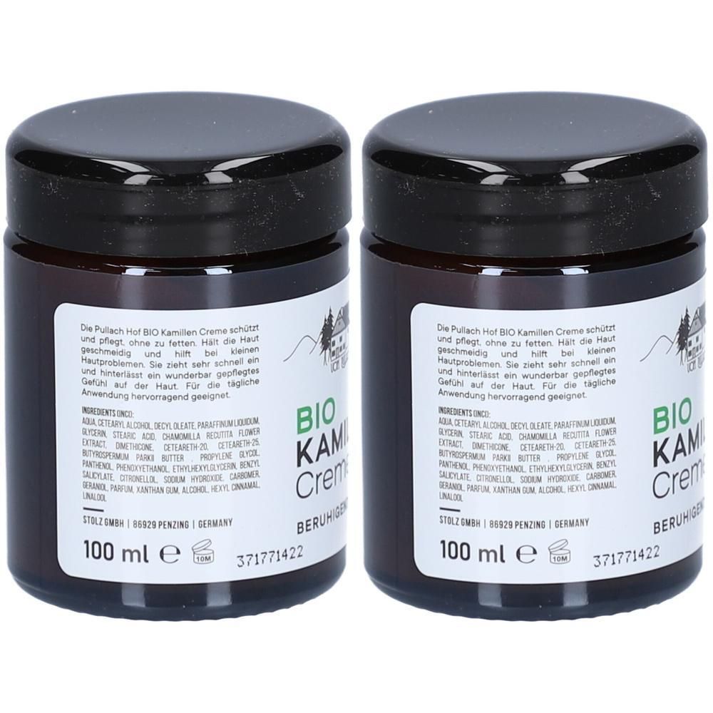 Zwei braune Tiegel mit schwarzem Deckel. Auf den Etiketten steht "BIO KAMILLE Creme". Darunter "100 ml e".