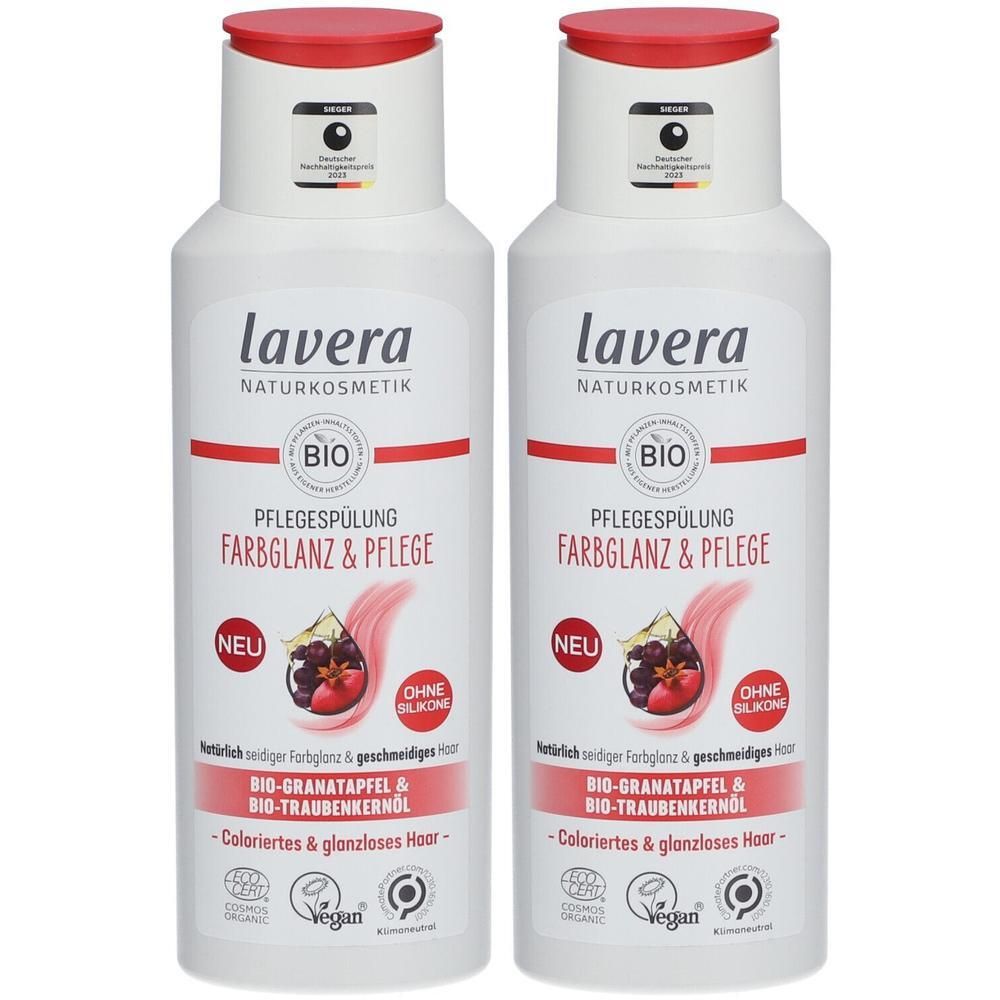Zwei weiße Flaschen mit rotem Deckel. Aufschrift: lavera, Pflegespülung Farbglanz & Pflege. Bio-Siegel, Vegan-Logo. Ohne Silikone.