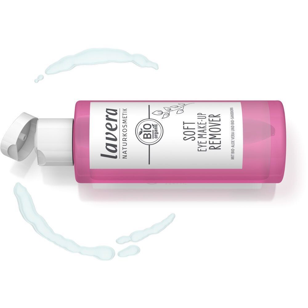 Rosa Flasche mit geöffnetem Deckel. Aufschrift: lavera NATURKOSMETIK, BIO organic, SOFT EYE MAKE-UP REMOVER. Wasserflecken.