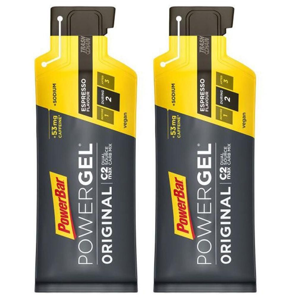 Zwei PowerBar Powergel Original Espresso. Gelbe und graue Verpackung mit Produktnamen und Inhaltsangaben. Vegan.