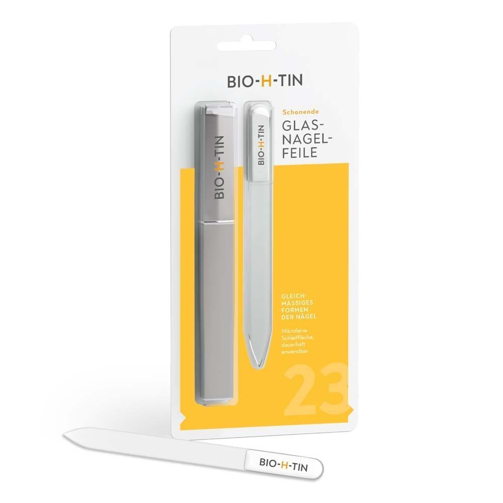 BIO-H-TIN® Glas-Nagelfeile in Verpackung. Gelbe Karte mit Produktname und Text. Feile und Hülle liegen daneben.