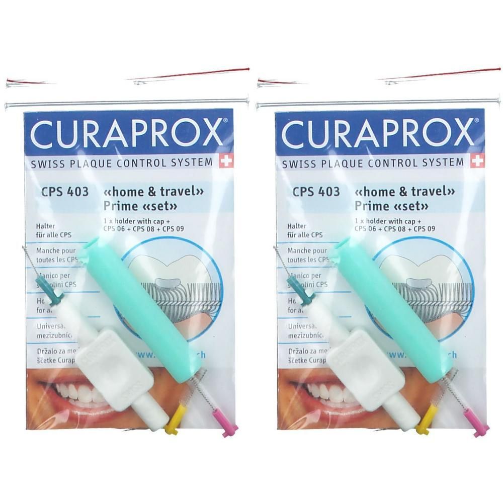 Zwei Sets Curaprox CPS 403 «home & travel». Jedes Set enthält Halter, Bürsten und eine Kappe. Verpackt in einer transparenten Tüte.