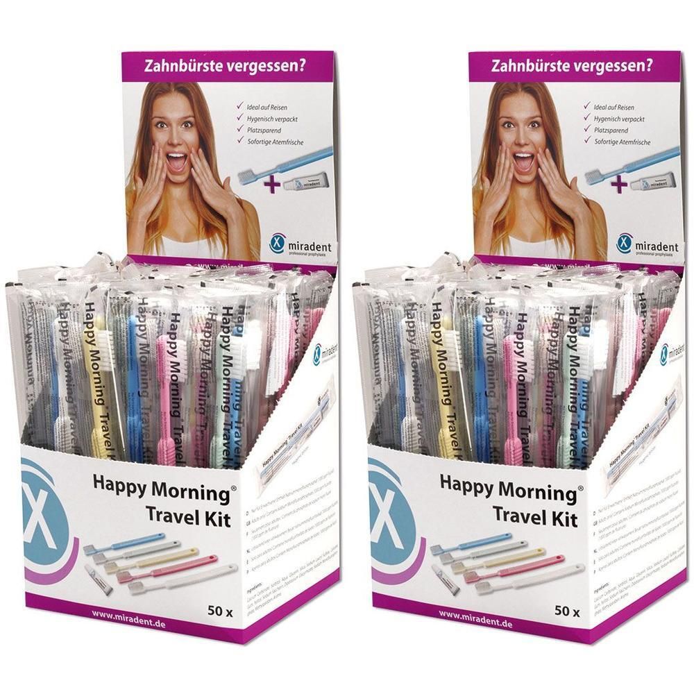 Zwei Displays mit Happy Morning® Travel Kit. Jedes Display enthält mehrere Kits. Aufdruck: Zahnbürste vergessen?