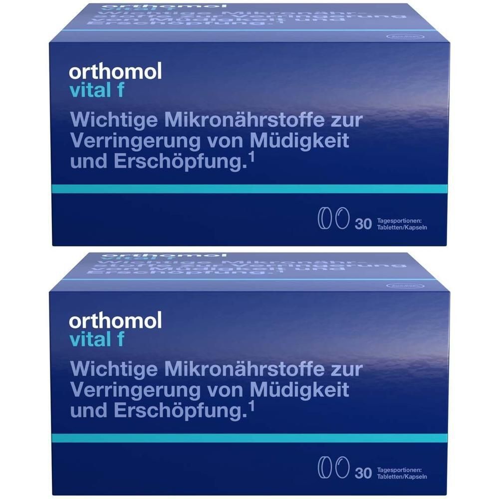 Zwei Packungen Orthomol vital f. Blaue Kartons mit Text. 30 Tagesportionen Tabletten/Kapseln.