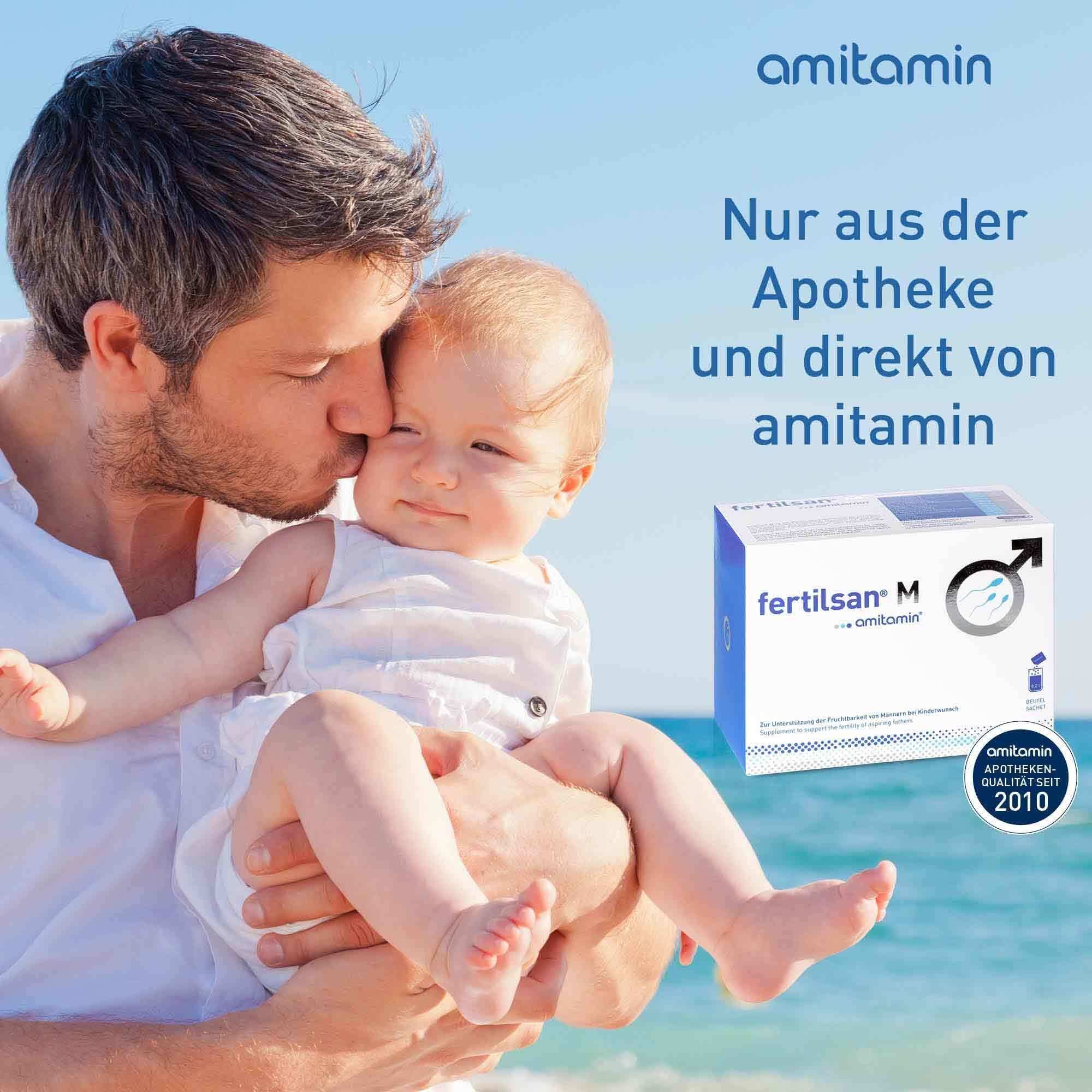 Vater küsst Baby, am Strand. Packung amitamin® fertilsan® M. Text: Nur aus der Apotheke und direkt von amitamin.