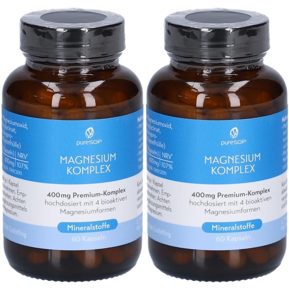 Zwei braune Glasflaschen mit schwarzen Deckeln. Blaue Etiketten mit weißer Schrift: Magnesium Komplex, 400mg, Mineralstoffe, 60 Kapseln.
