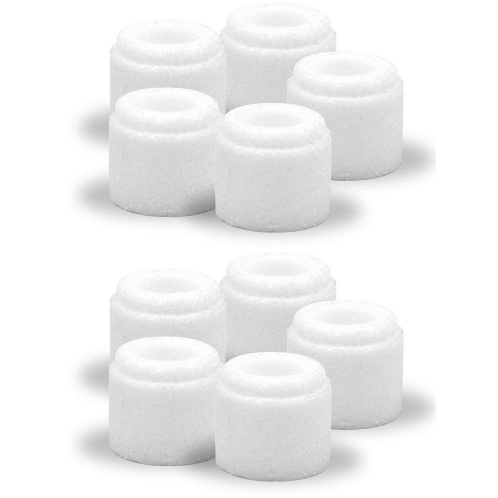 Mehrere weiße, zylindrische Filter mit abgerundeten Kanten. Sie sind in zwei Gruppen angeordnet, jeweils mit einem Loch in der Mitte.