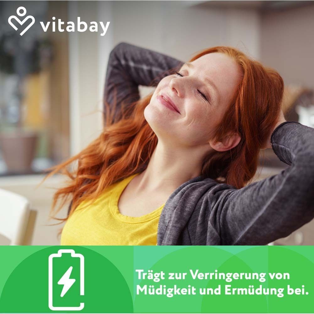 Frau mit geschlossenen Augen. Text: Trägt zur Verringerung von Müdigkeit und Ermüdung bei.