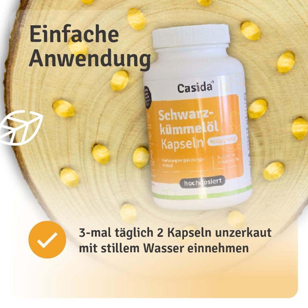 Weiße Flasche Casida® Schwarzkümmelöl Kapseln. Aufschrift: Kapseln, hochdosiert. Text: 3-mal täglich 2 Kapseln unzerkaut mit stillem Wasser einnehmen.