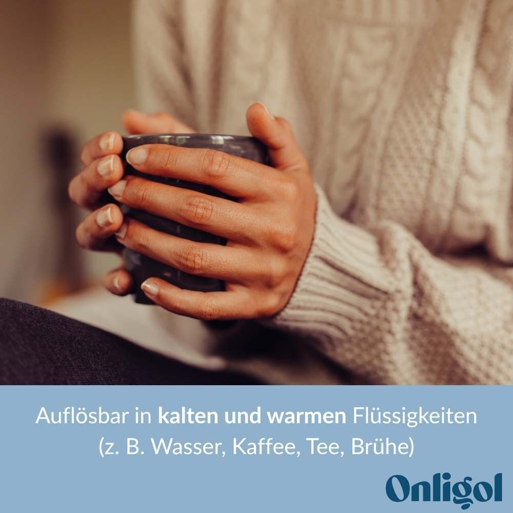 Hände halten eine Tasse. Text: Auflösbar in kalten und warmen Flüssigkeiten (z.B. Wasser, Kaffee, Tee, Brühe).