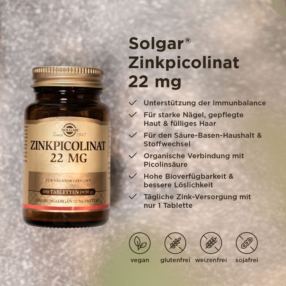 Eine Flasche SOLGAR Zinkpicolinat 22 mg Tabletten. Braune Glasflasche mit goldenem Deckel und Etikett. Text: Zinkpicolinat 22 mg, 100 Tabletten. Neben Texten über Vorteile.