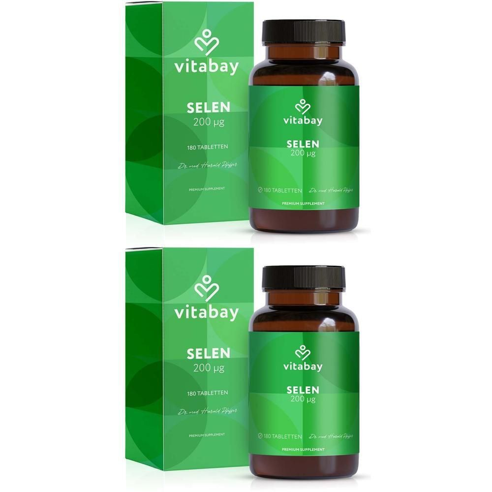 Zwei Flaschen und zwei grüne Schachteln mit dem Produkt Selen 200 µg von Vitabay. Braune Flaschen, grüne Etiketten.