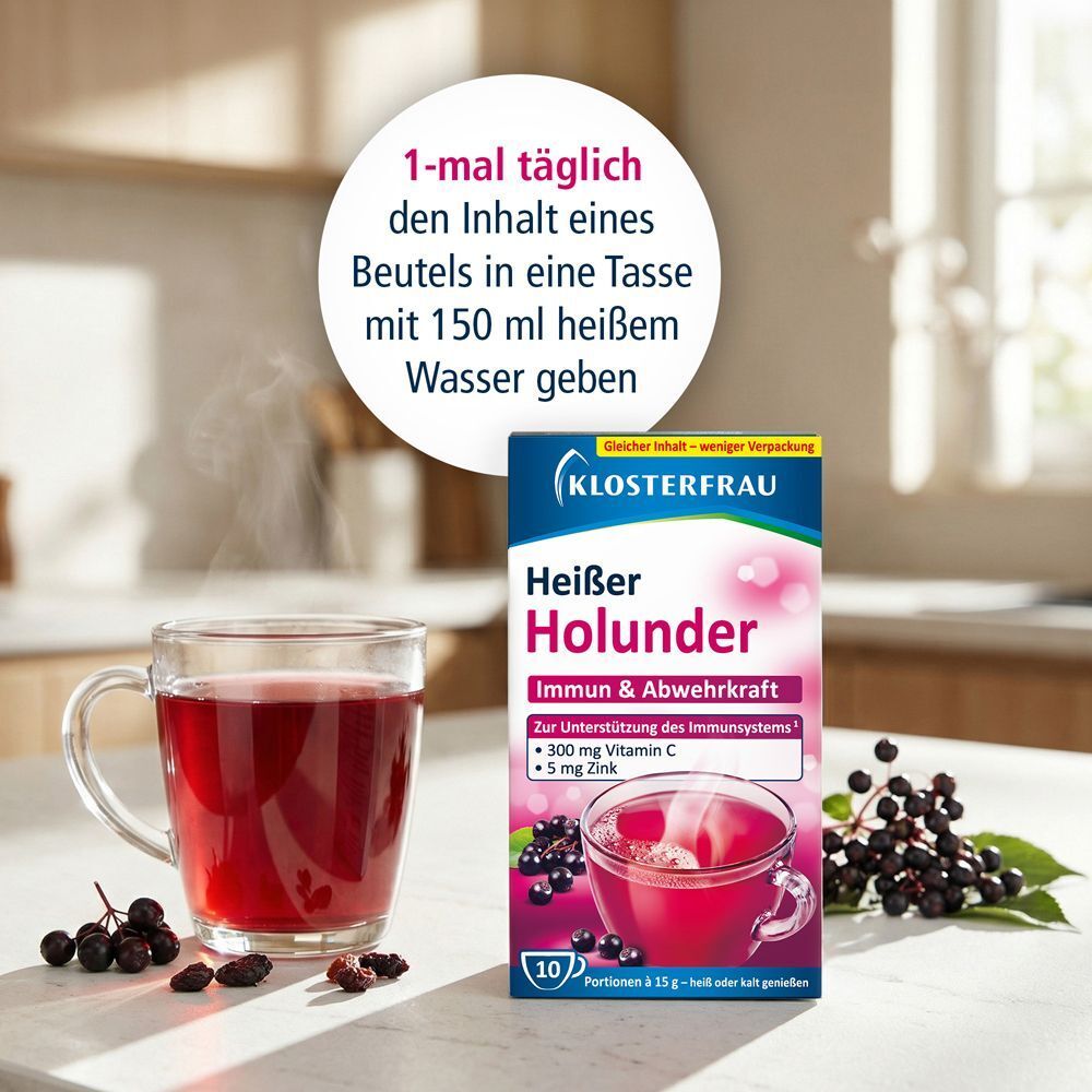 Glas mit rotem Getränk, daneben Packung KLOSTERFRAU Heißer Holunder. Text: 1-mal täglich den Inhalt in eine Tasse mit heißem Wasser geben.