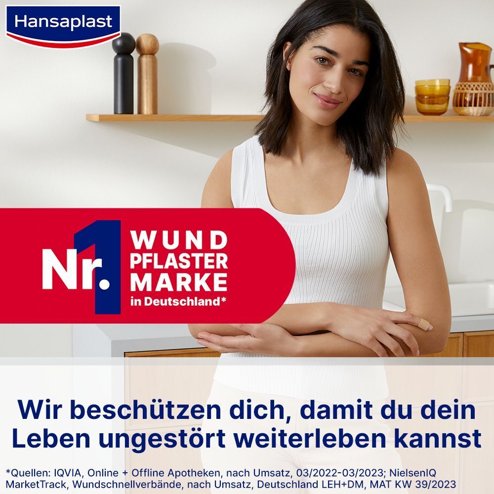 Frau in Küche. Rotes Schild: Nr. 1 Wundpflaster Marke in Deutschland. Text: Wir beschützen dich...