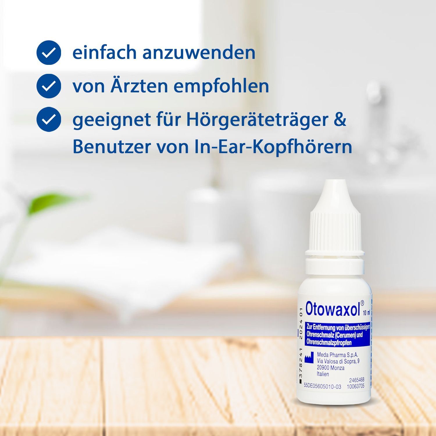 Produktflasche auf Holzoberfläche. Flasche mit weißem Verschluss und Etikett. Text: einfach anzuwenden, von Ärzten empfohlen, geeignet für Hörgeräteträger.