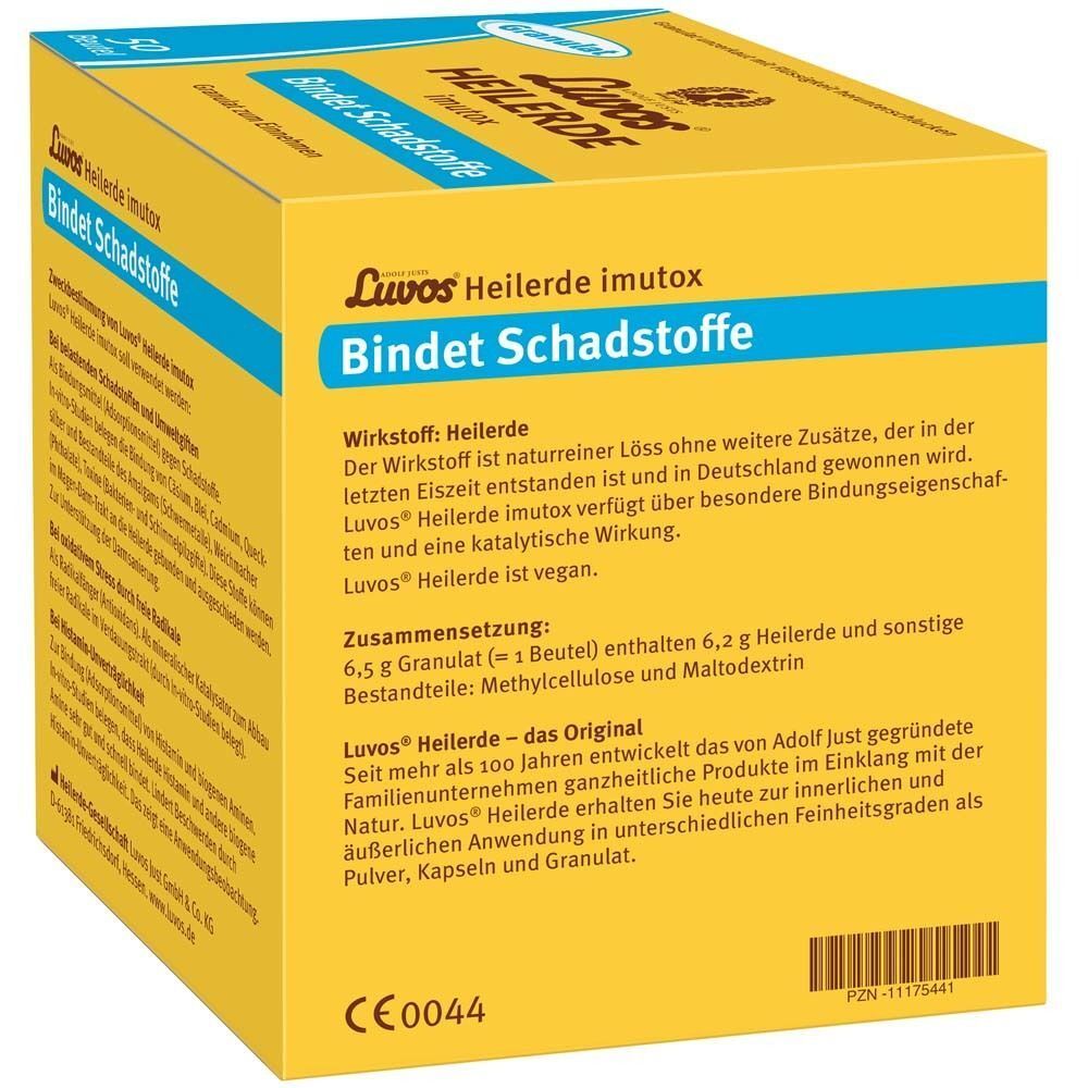 Gelber Karton mit Produktaufdruck. Aufschrift: Luvos Heilerde imutox, Bindet Schadstoffe. Text mit Inhaltsangaben.