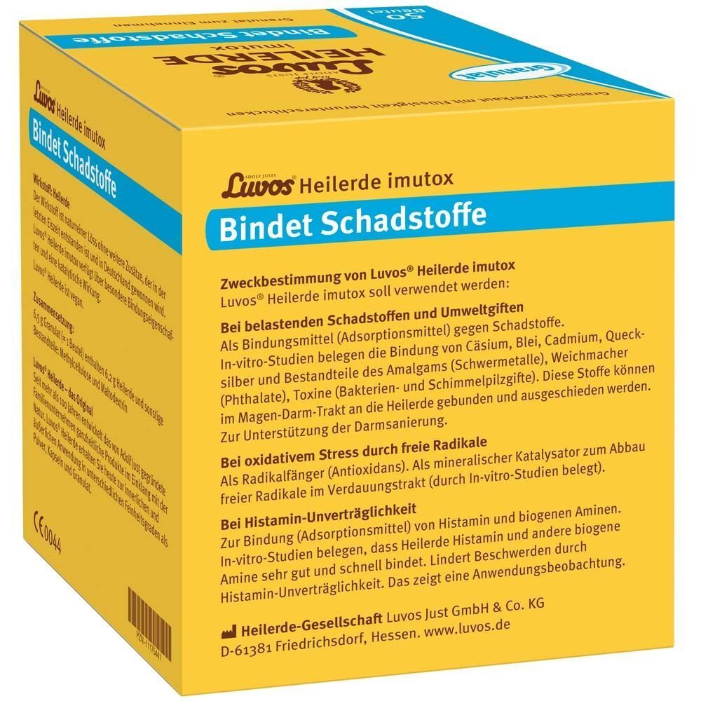 Gelber Karton mit Produktaufdruck. Aufschrift: Luvos Heilerde imutox, Bindet Schadstoffe. Text über Wirkungsweise.