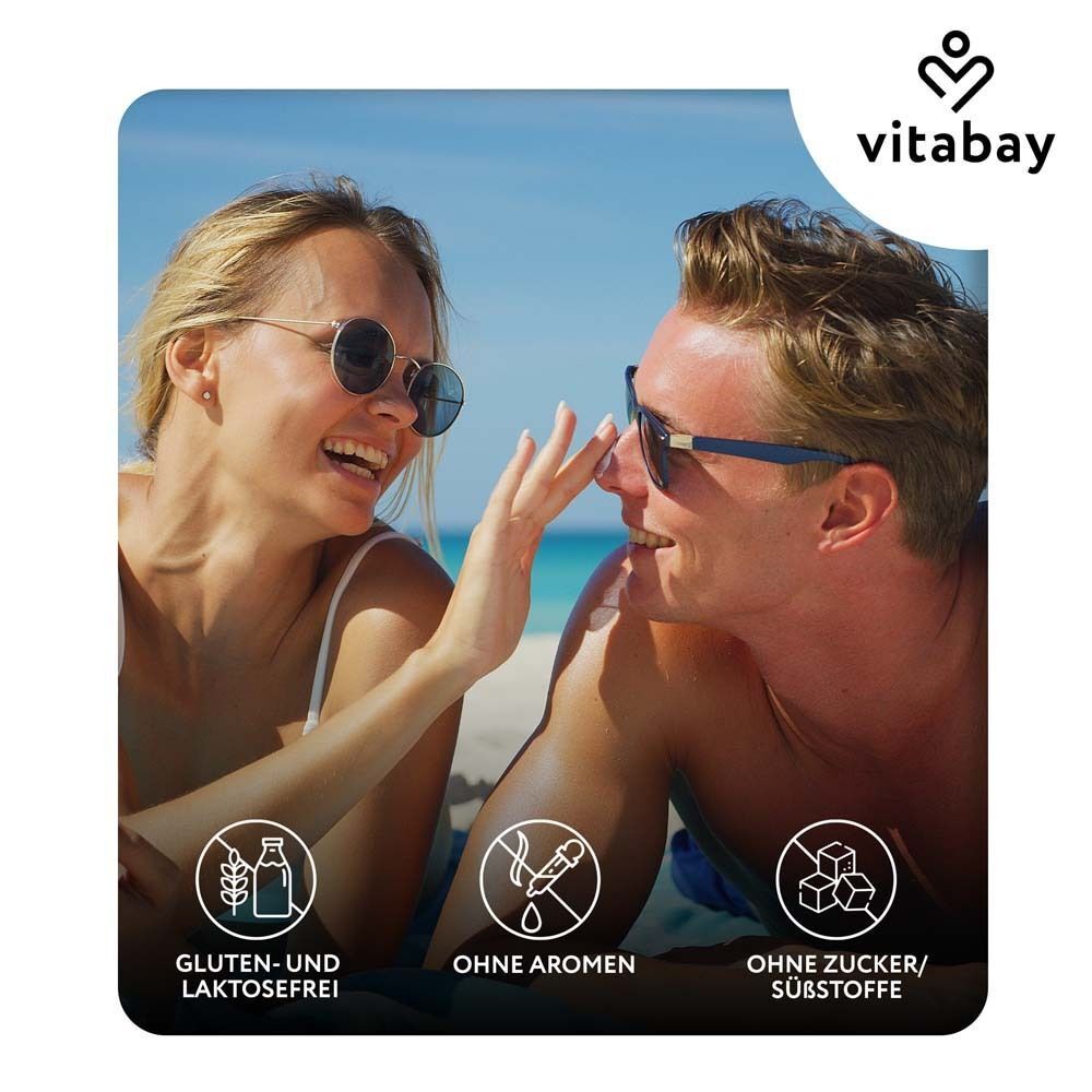 Paar am Strand. Text: Gluten- und Laktosefrei, Ohne Aromen, Ohne Zucker/Substoffe. Marke: vitabay.