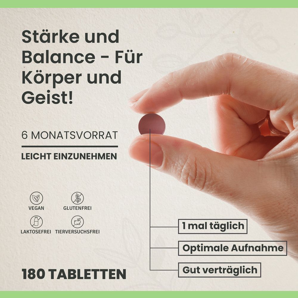 Hand hält eine rote Tablette. Text: Stärke und Balance. 6 Monatsvorrat. Vegan, glutenfrei, laktosefrei, tierversuchsfrei. 180 Tabletten.