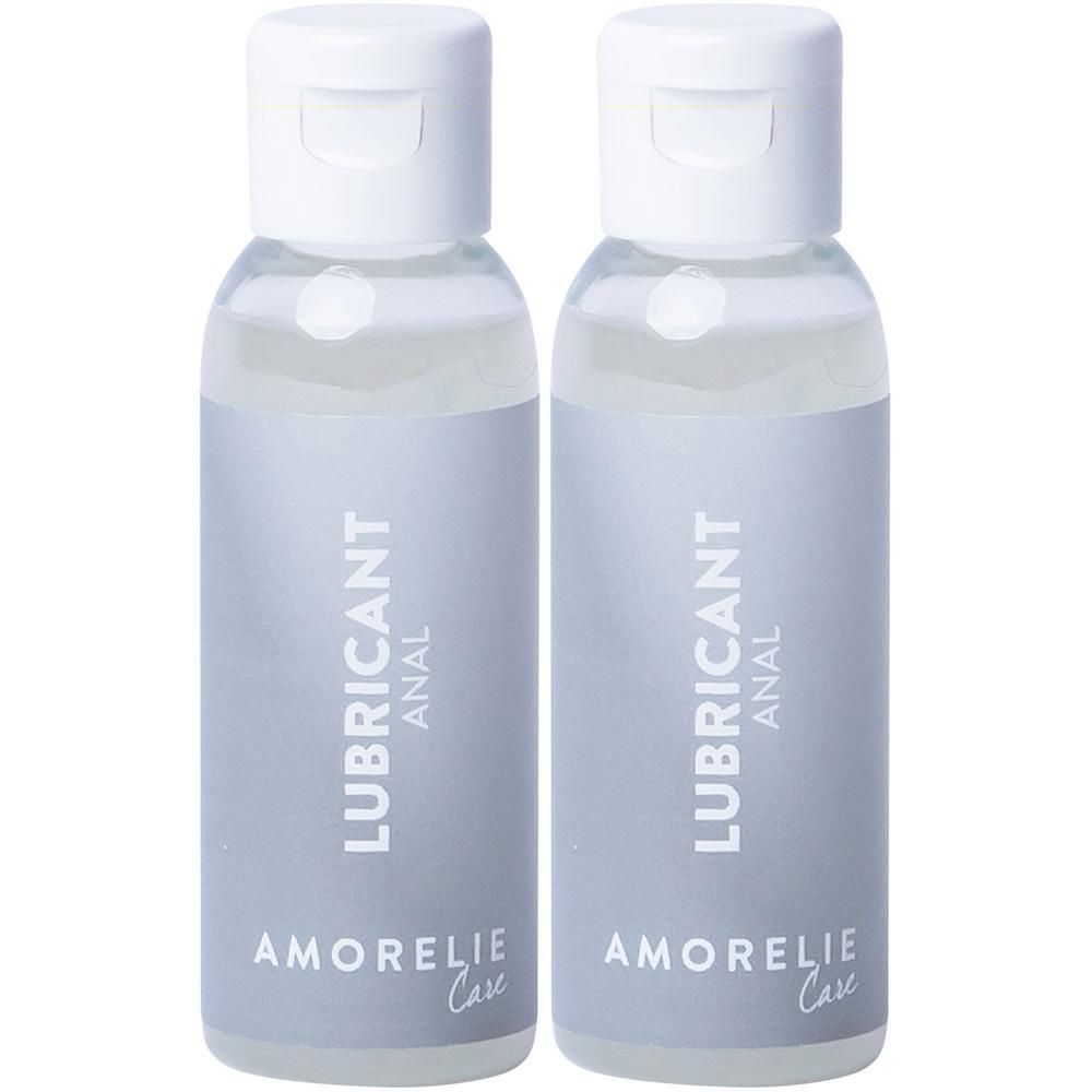 Zwei Flaschen mit weißem Deckel und grauer Etikettierung. Aufschrift: LUBRICANT ANAL, AMORELIE Care.