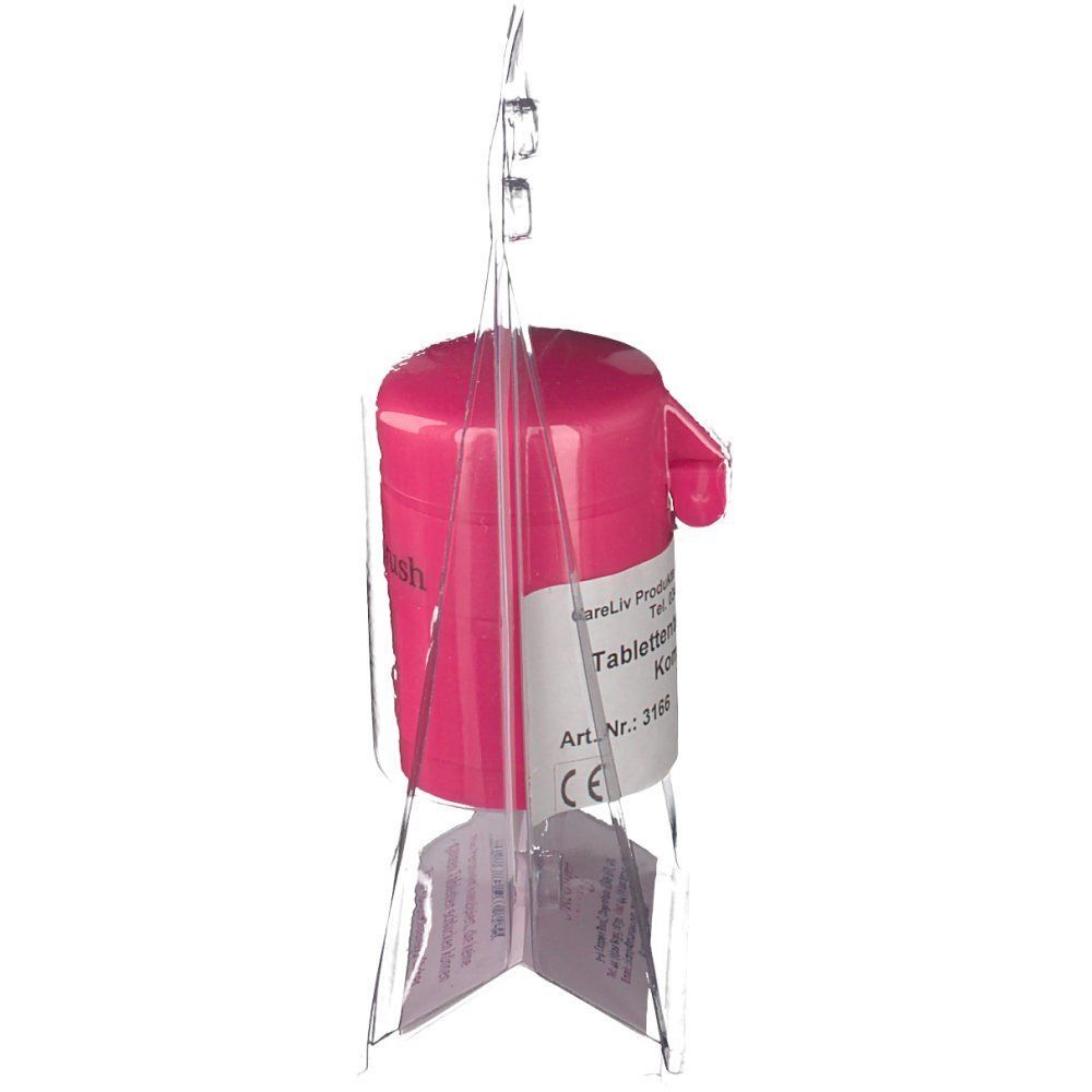 Pinkfarbener Tablettenteiler/Mörser in transparenter Verpackung. Seitliche Ansicht. Aufdruck: Pill Cut & Crush. Mit CE-Kennzeichnung.