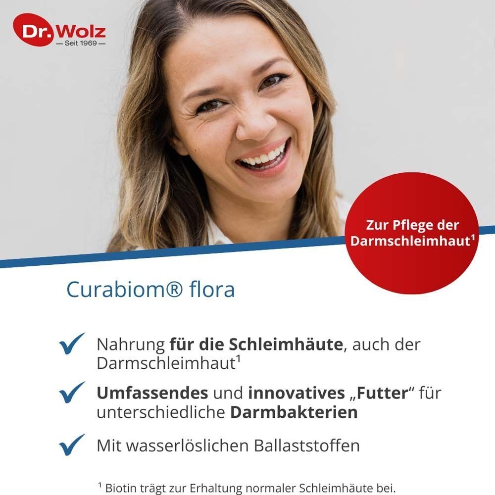 Frau lächelt. Text: CURABIOM flora, Nahrung für die Schleimhäute. Umfassendes Futter für Darmbakterien. Mit wasserlöslichen Ballaststoffen.