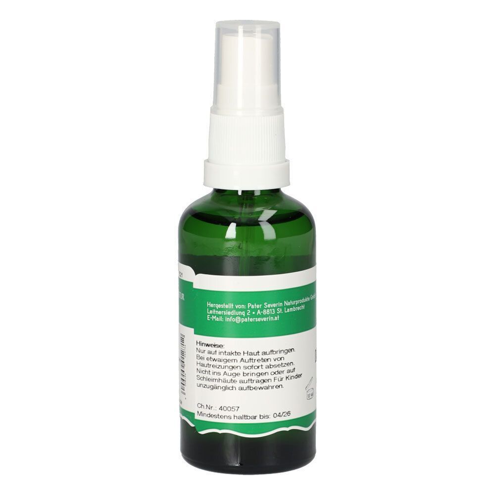 Grüne Glasflasche mit Sprühkopf. Rückseite mit Text und grüner Beschriftung.