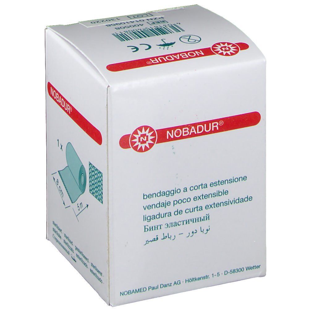 Weiße Verpackung mit rotem Logo und Produktabbildung. Zeigt eine aufgerollte Kurzzugbinde. Maße: 8 cm x 5 m. Text: NOBADUR®.