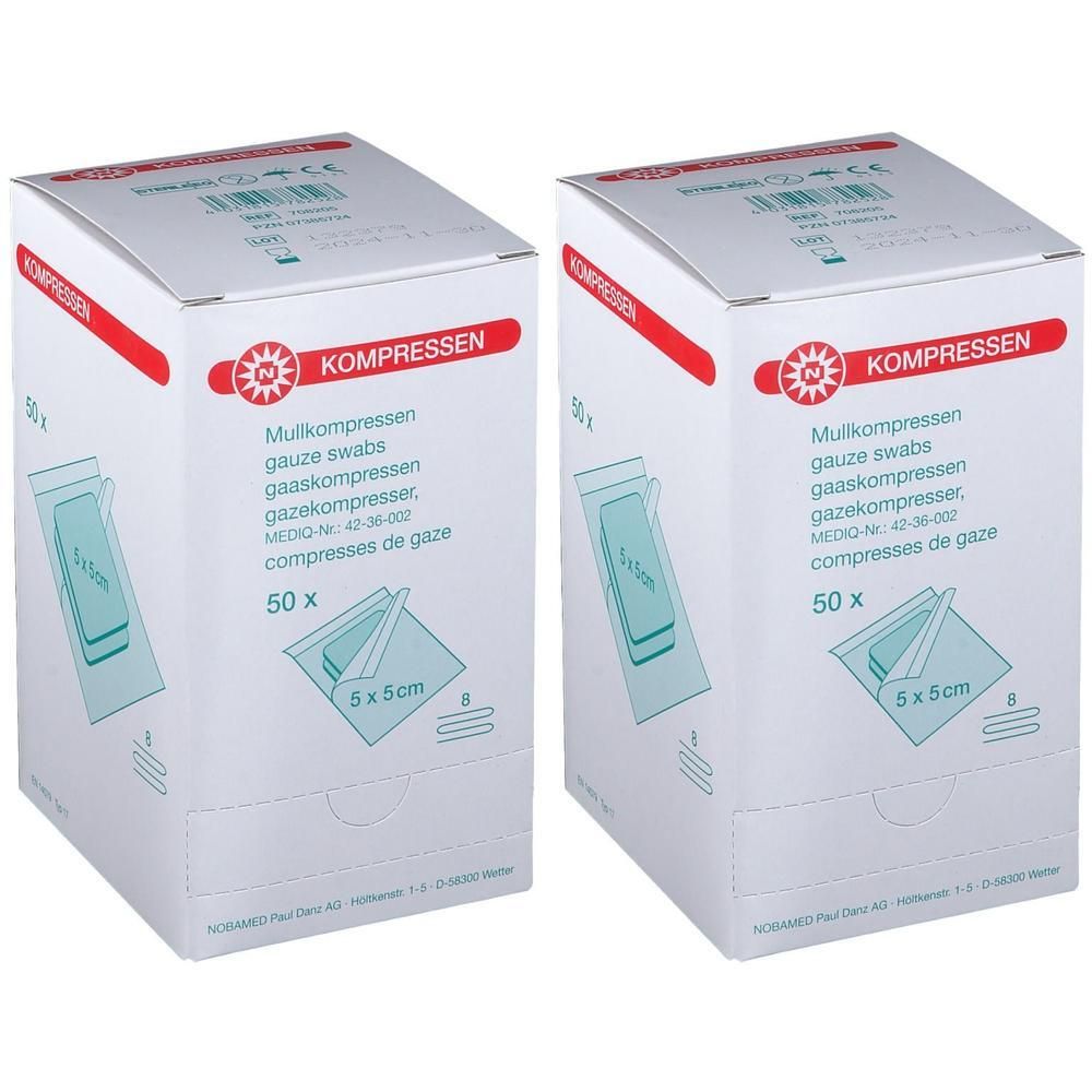 Zwei Kartons mit Mullkompressen. Aufdruck: KOMPRESSEN, 50 Stück, 5x5cm. Produktabbildung auf der Verpackung.
