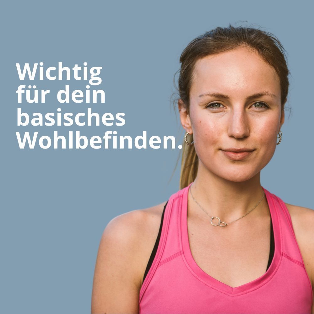 Porträt einer Frau in pinkfarbenem Top. Text: Wichtig für dein basisches Wohlbefinden.
