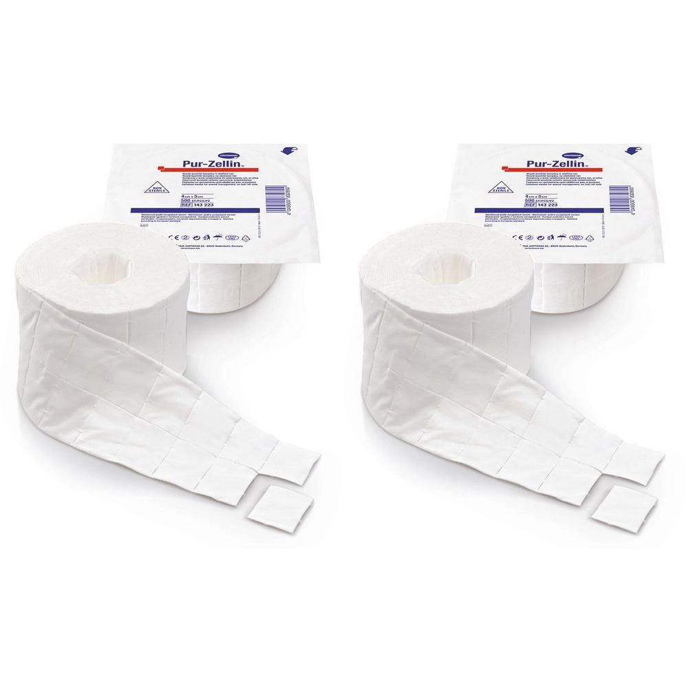 Zwei Rollen Verbandsmaterial mit Verpackung. Aufschrift: Pur-Zellin. Ausgebreitete, quadratische Pads.