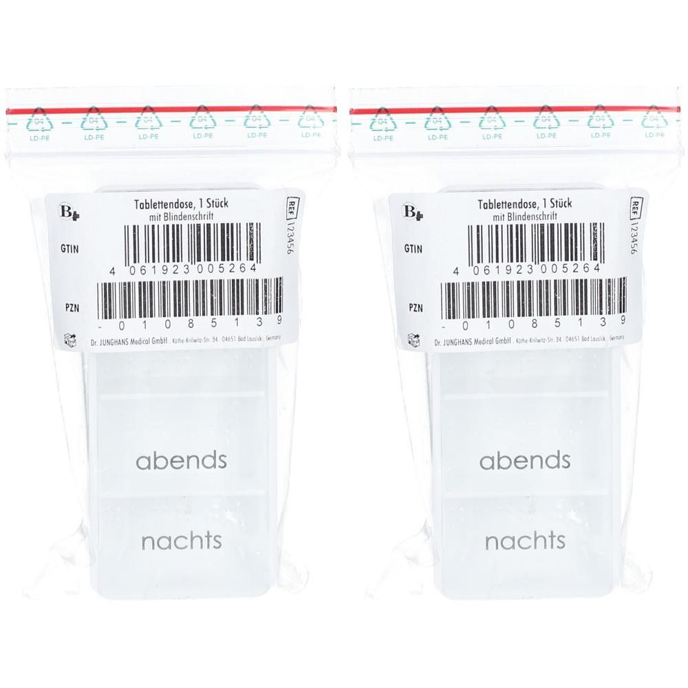 Zwei Tablettendosen in Plastikverpackung. Aufschrift: abends, nachts. Etikett mit Barcode und Text: Tablettendose, 1 Stück mit Blindenschrift.