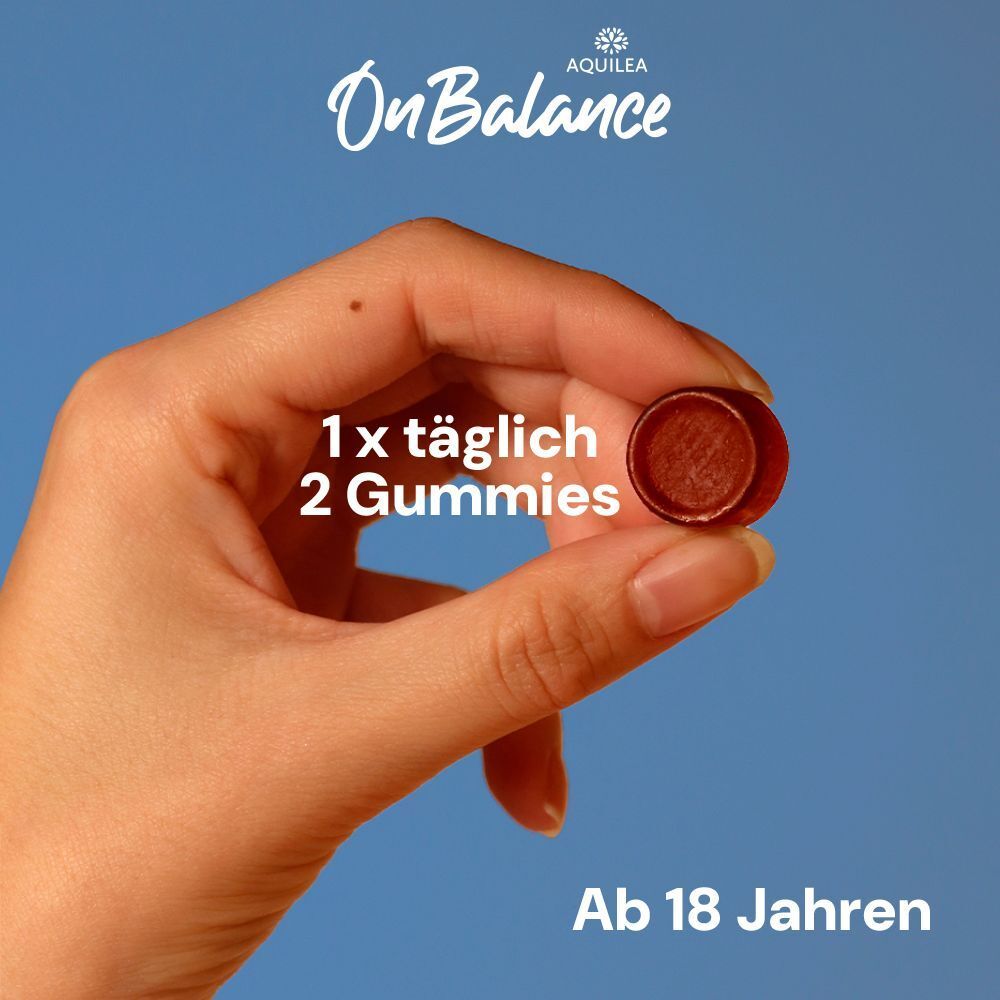 Eine Hand hält ein einzelnes Gummibärchen. Text: '1 x täglich 2 Gummies'. Ab 18 Jahren.