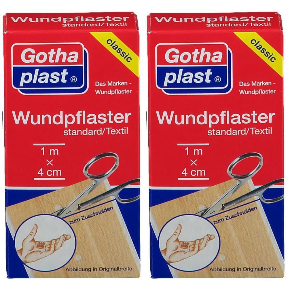 Zwei rote Kartons mit Gothaplast Wundpflaster. Aufschrift: Wundpflaster, 1 m x 4 cm. Mit Schere und Hand-Abbildung.