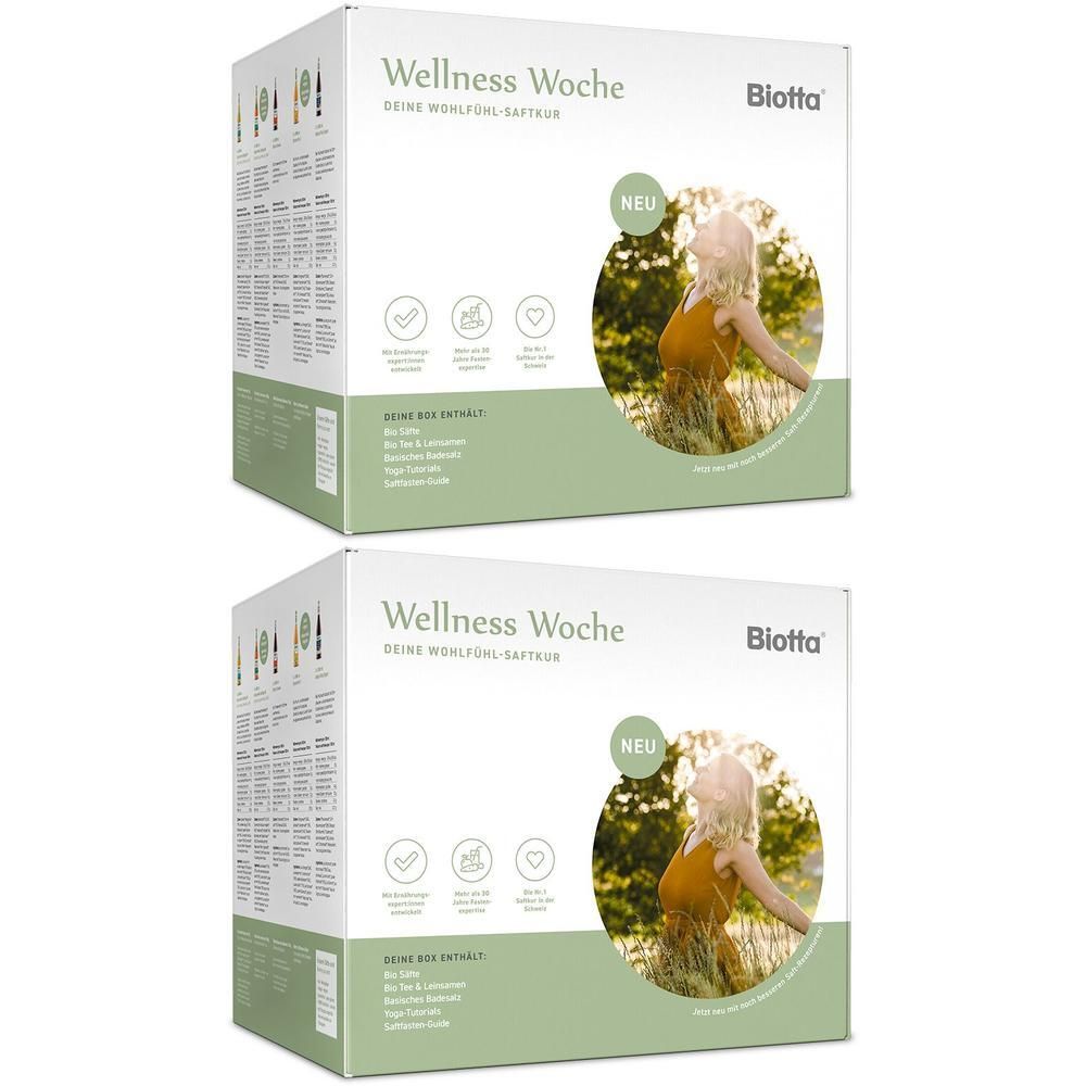 Zwei Packungen Biotta Wellness Woche mit Saftflaschen und Beutel.