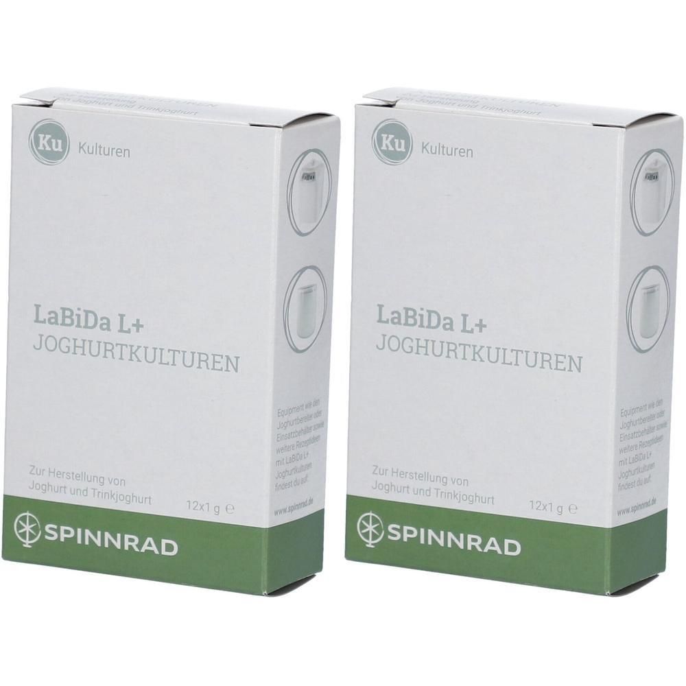 Zwei weiße Kartons mit Aufschrift "LaBiDa L+ JOGHURTKULTUREN". Grün-weiße Verpackung mit Logo und Text. 12x1 g.